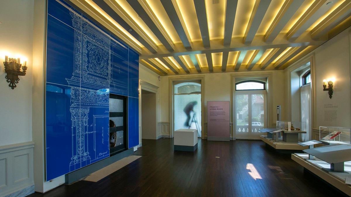 An original architectural drawing of a living room fireplace mantel, by Henry Hoit, was enlarged and printed on blue glass. The renovated Kansas City Museum devotes its first-floor galleries to R.A. Long and his family.