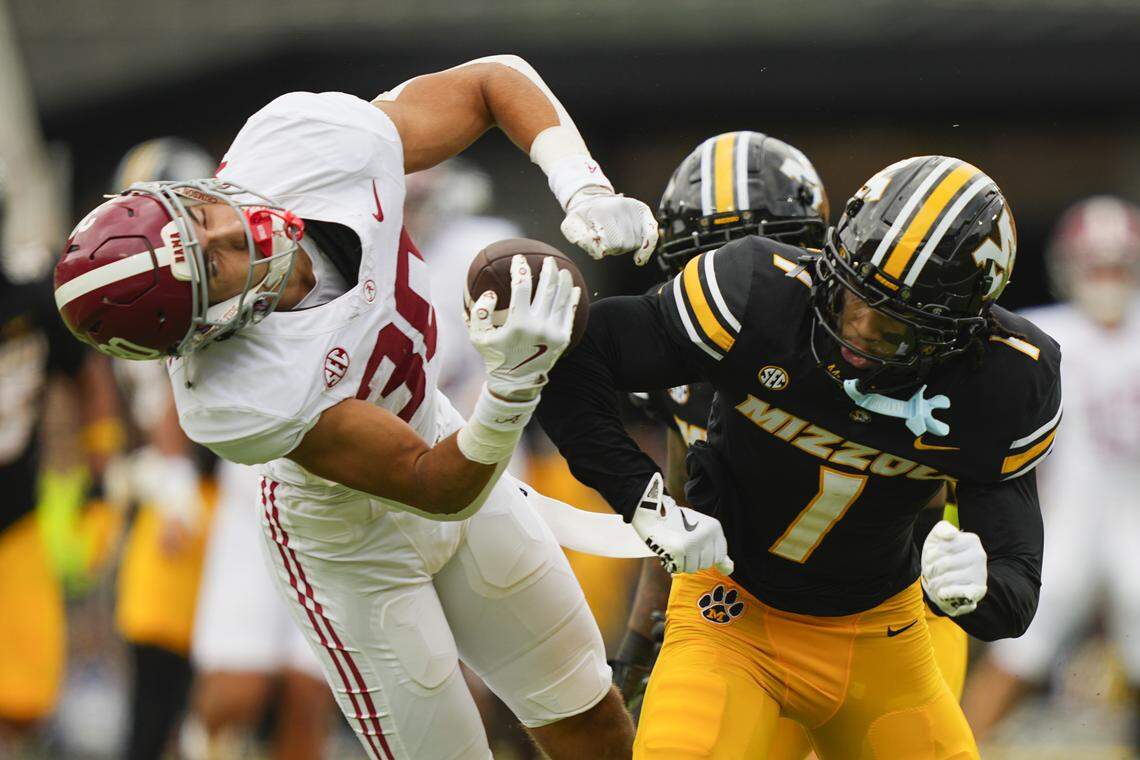 Missouri Tigers safety Marvin Burks (1) hits Alabama Crimson Tide wide receiver Derek Meadows (30) and is ejected for targeting during the first half of the game at Faurot Field at Memorial Stadium on Oct. 11, 2025.