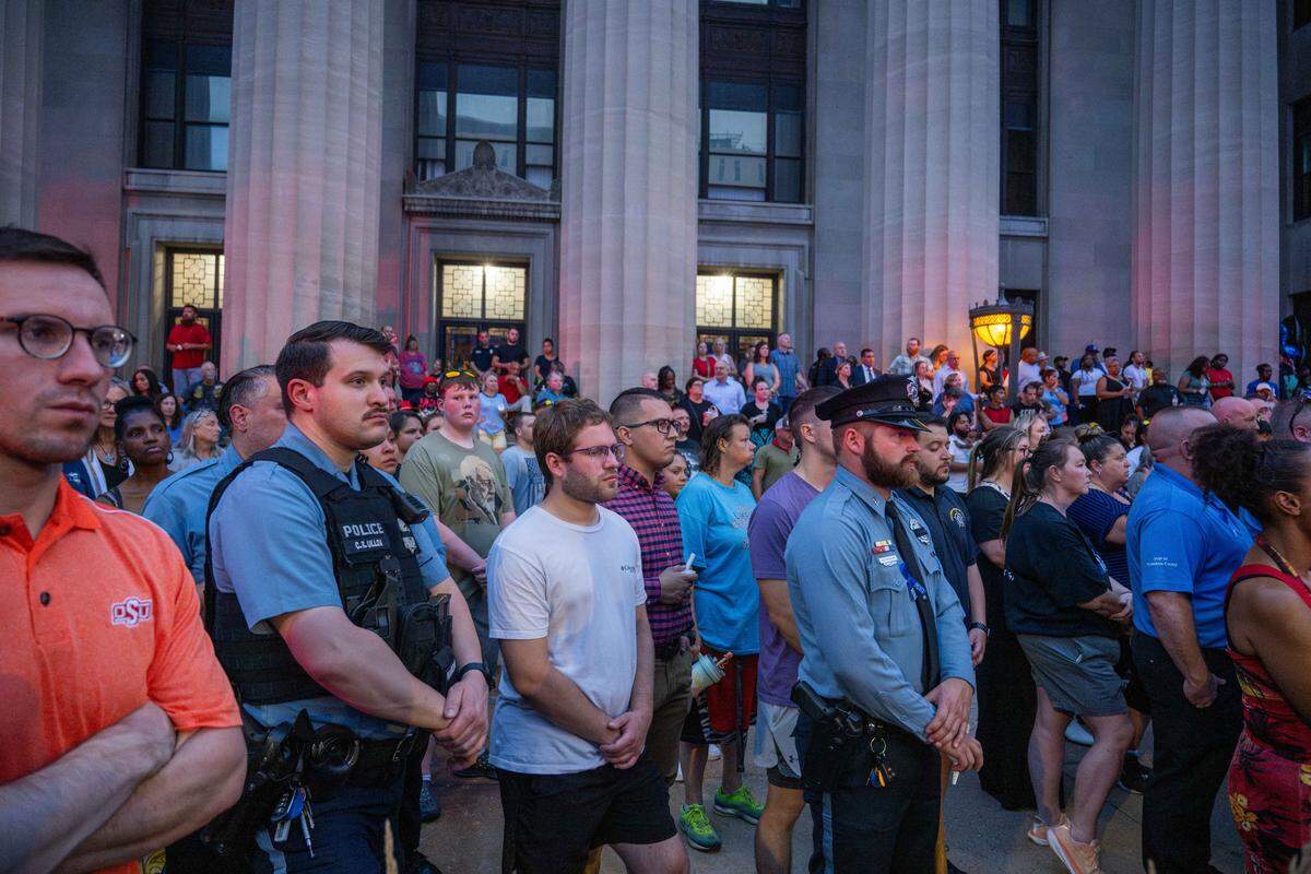 Hundreds of people attend a candlelight vigil held for slain KCK sheriff’s deputy Elijah Ming outside the Wyandotte County Courthouse on Wednesday, July 30, 2025. The nearly nine-year veteran died in the line of duty on Saturday, July 26, 2025.