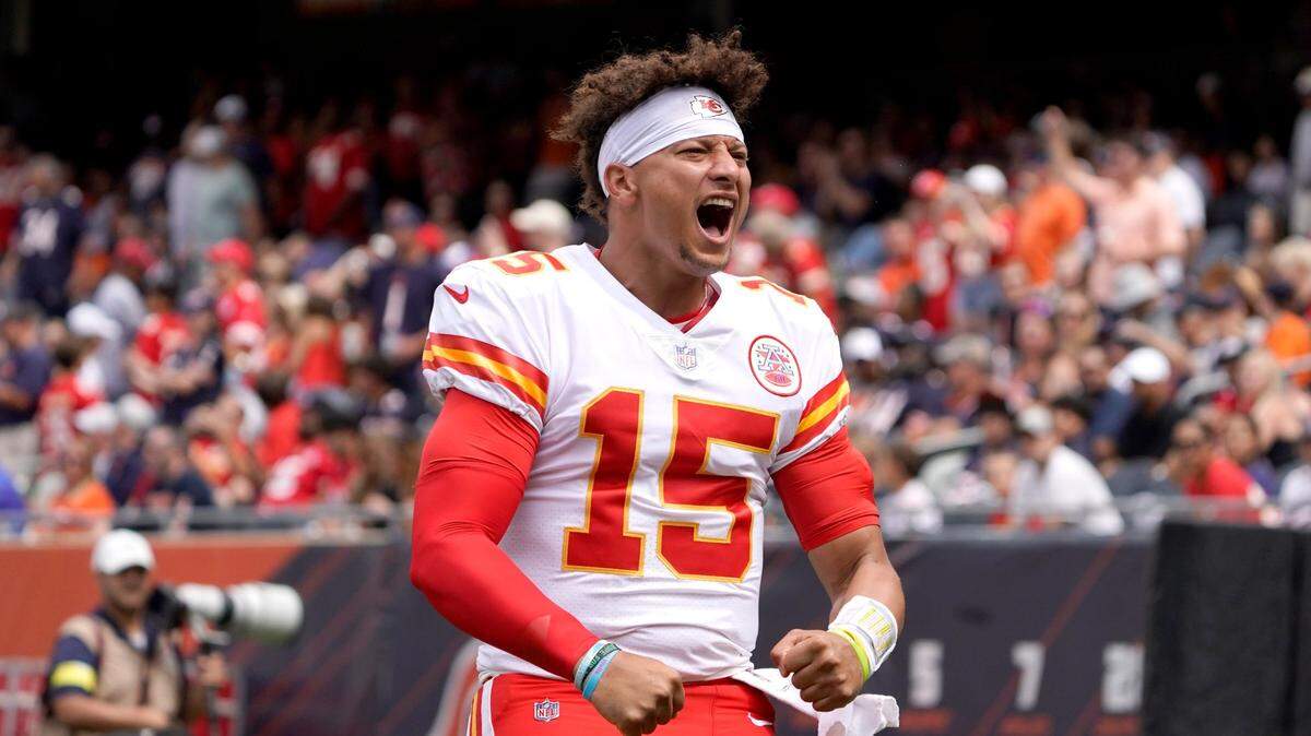 Chiefs quarterback Patrick Mahomes gets the Chiefs fans at Soldier Field excited during Saturday’s game against the Bears at Soldier Field in Chicago.