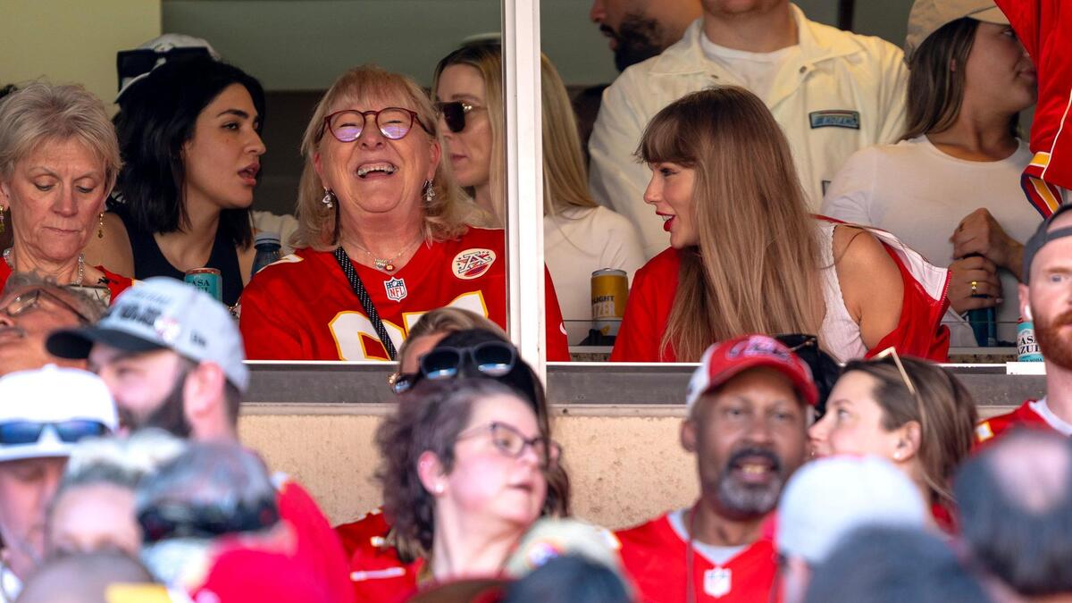 Singer Taylor Swift chats with Donna Kielce, mother of tight end Travis Kelce (87), during an NFL football game between the Kansas City Chiefs and the Chicago Bears at GEHA Field at Arrowhead Stadium on Sunday, Sept. 24, 2023, in Kansas City.