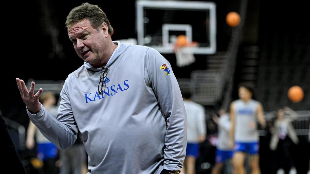 Kansas coach Bill Self speaks with a reporter ahead of the 2023 Big 12 Conference Tournament at T-Mobile Center in Kansas City. Self missed the tournament due to a health issue.