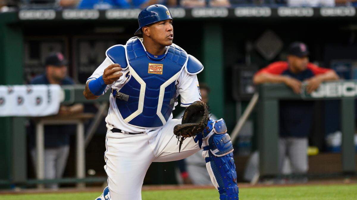 Kansas City Royals catcher Salvador Perez after tagging out a Boston Red Sox runner at home plate during the third inning of a baseball game in Kansas City, Mo., Friday, June 18, 2021. (AP Photo/Reed Hoffmann)