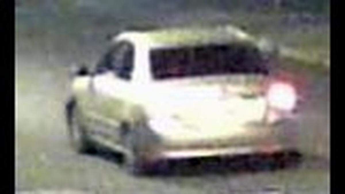 Police released photos of a silver or gold sedan that was seen in the area. Police are attempting to identify the vehicle and talk to its occupants about the fatal shooting.