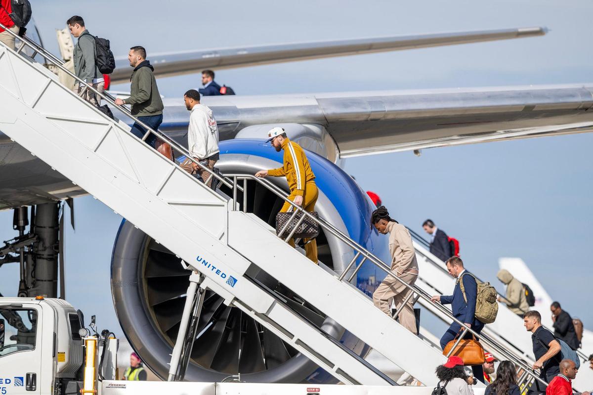 The Kansas City Chiefs board a United Airlines flight from Kansas City International Airport on Sunday, Feb. 2, 2025, traveling to New Orleans for Super Bowl LIX.