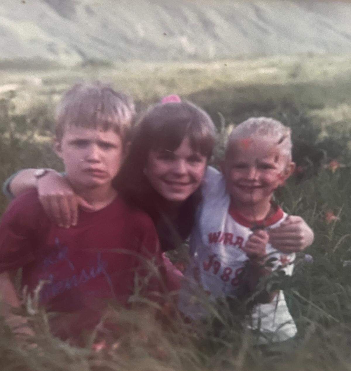 Ryan Everson, left, with his siblings Erin Swart and Noel Everson, in Alaska.
