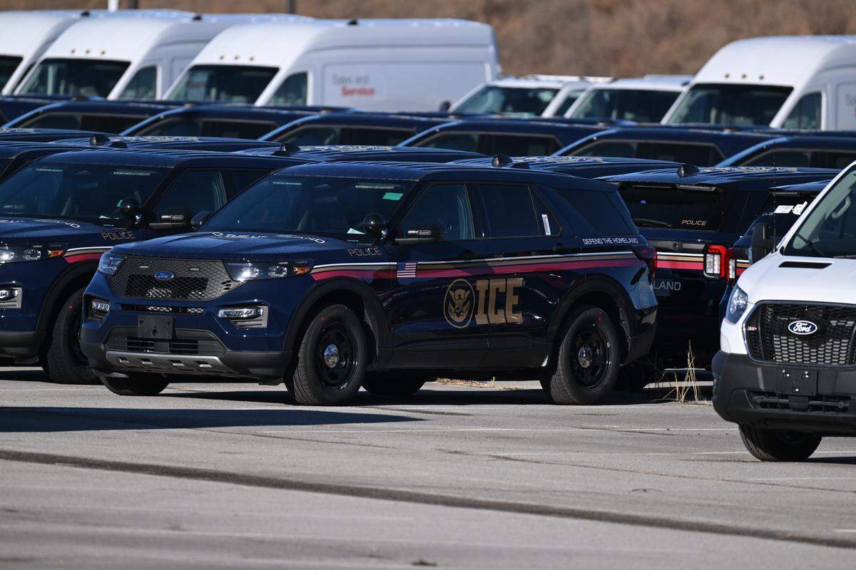 ICE vehicles parked in a lot near Worlds of Fun in Kansas City on Wednesday, Jan. 14, 2026.
