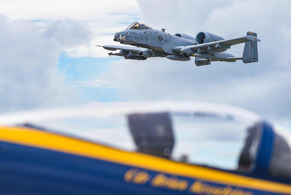 A U.S. Air Force A-10 Thunderbolt flew past the parked Blue Angels at the New Century AirCenter Thursday, July 1, in preparation for the 2021 KC Air Show on Saturday and Sunday. Last year’s air show was canceled due to the pandemic.