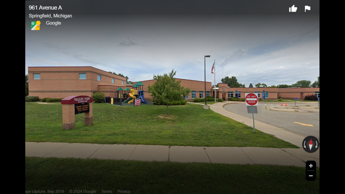 A knife-wielding man is accused of attacking a family member outside a Michigan elementary school in a fight about Easter eggs, officials say.