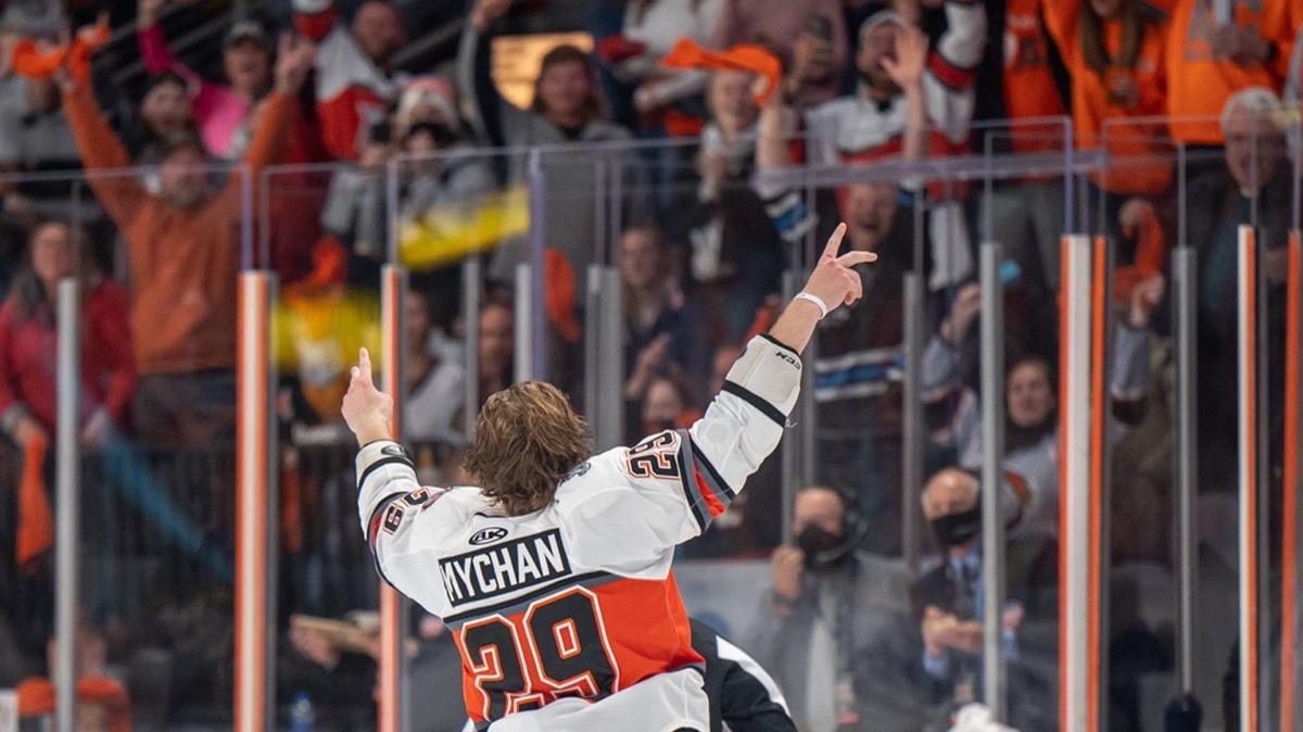Forward Jesse Mychan and the Kansas City Mavericks beat the Iowa Heartlanders 5-3 in their home opener at Cable Dahmer Arena Saturday night.