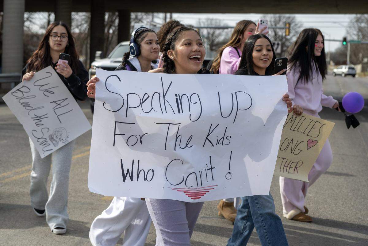 Raising their voices against ICE and the and the current administration's policies, Shawnee Mission North students surged down Johnson Drive in Overland Park on Wednesday, February 11, 2026.