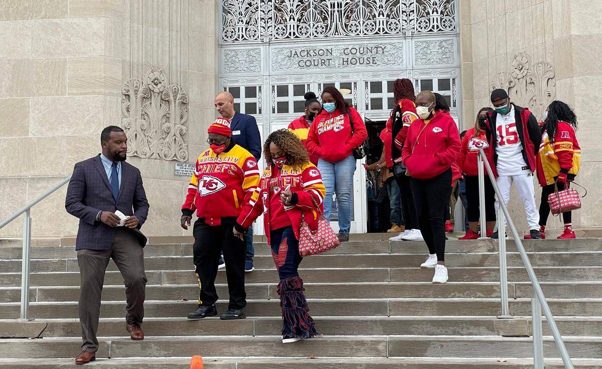Cameron LambÕs family and supporters leave the Jackson County Courthouse after Circuit Court Judge J. Dale Youngs announced on Friday, November 19, 2021, that he found Eric DeValkenaere, a Kansas City police detective, guilty in the fatal December 2019 shooting of Cameron Lamb.