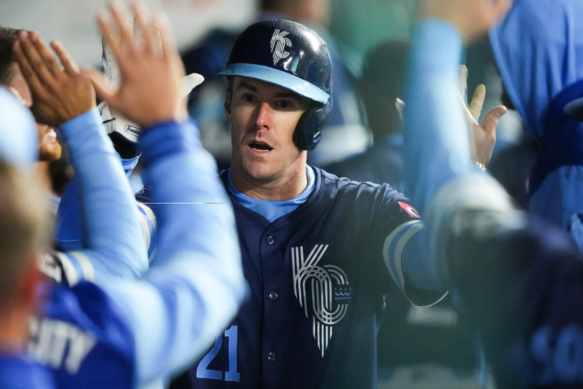 Mark Canha celebrates with teammates after scoring for the Royals during a game against the Baltimore Orioles at Kauffman Stadium in Kansas City on April 4, 2025.