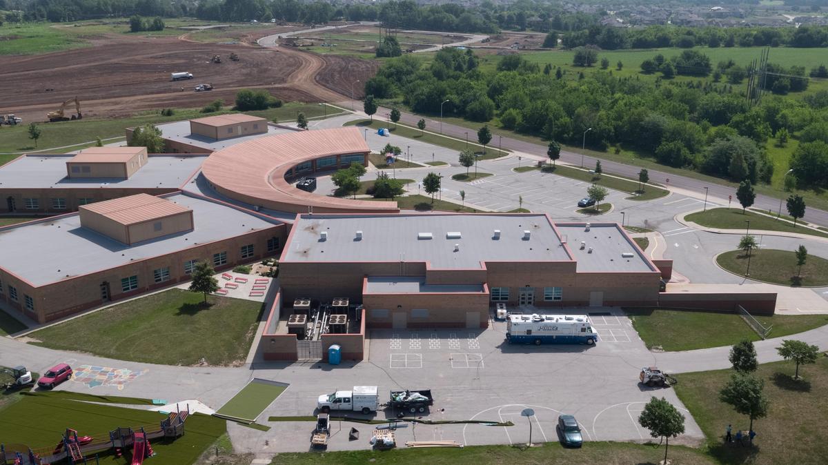 Sunrise Point Elementary School near Roe Avenue and 159th Street in Overland Park where two people were shot while they were working on the school's playground.