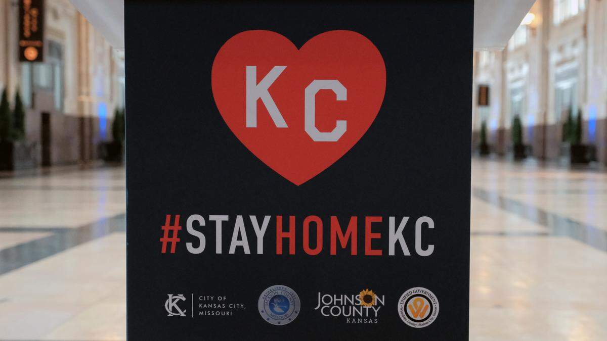 A banner urged area residents to stay home as officials from Jackson, Johnson and Wyandotte counties joined Kansas City Mayor Quinton Lucas at Union Station. The officials discussed the stay at home order issued to stop the coronavirus.