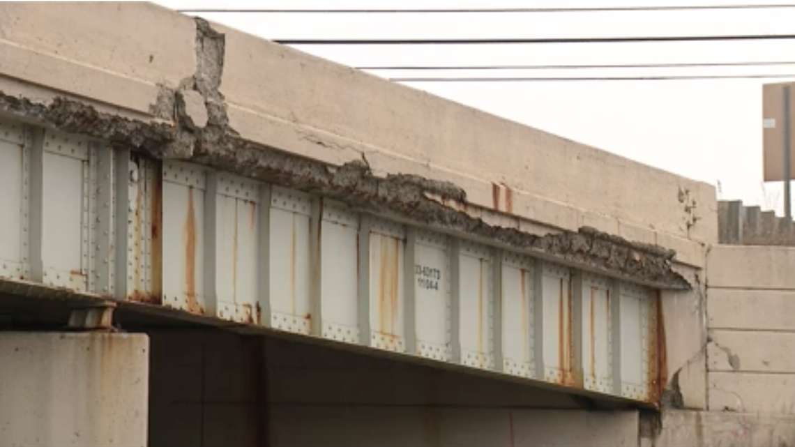 Tracie Moonen says a concrete piece fell from a Michigan overpass and landed on her car.