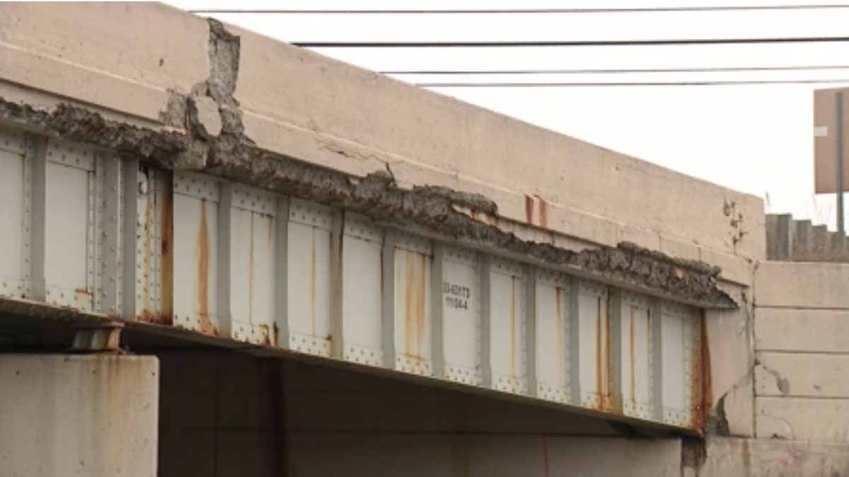 Tracie Moonen says a concrete piece fell from a Michigan overpass and landed on her car.