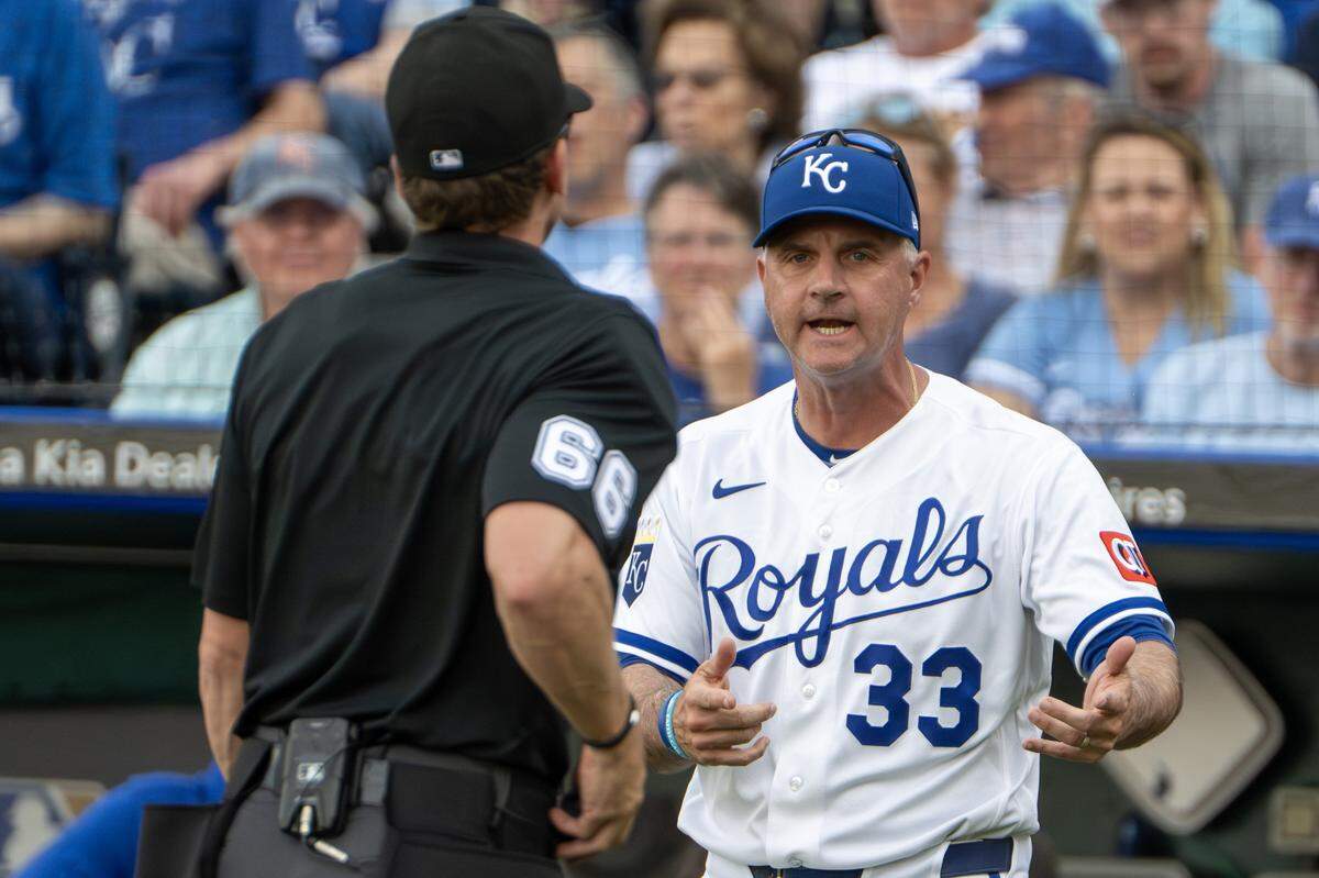 Kansas City Royals manager Matt Quatraro argues with the  umpire in the seventh inning during the home opener game against the Minnesota Twins at Kauffman Stadium on Monday, March 30, 2026, in Kansas City.