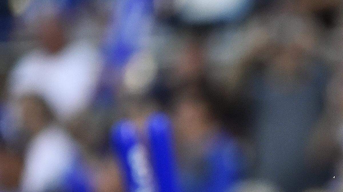Royals fans cheer during Friday's baseball game against the Detroit Tigers at Kauffman Stadium.