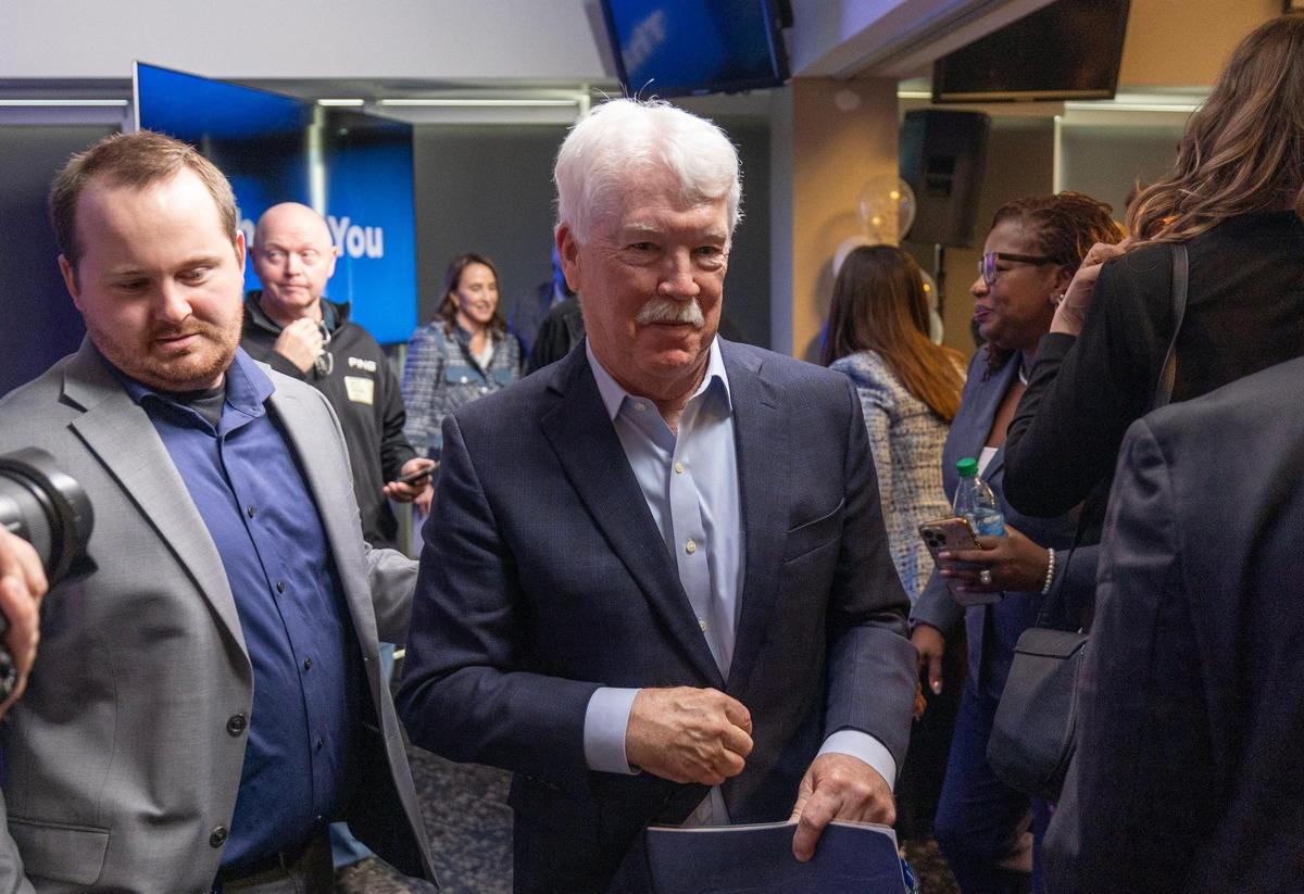 Kansas City Royals chairman and CEO John Sherman leaves a press conference at Kauffman Stadium on Tuesday where the team announced their intentions to build a new ballpark in downtown Kansas City. The team hopes to have a complete ballpark ready for opening day in 2028.