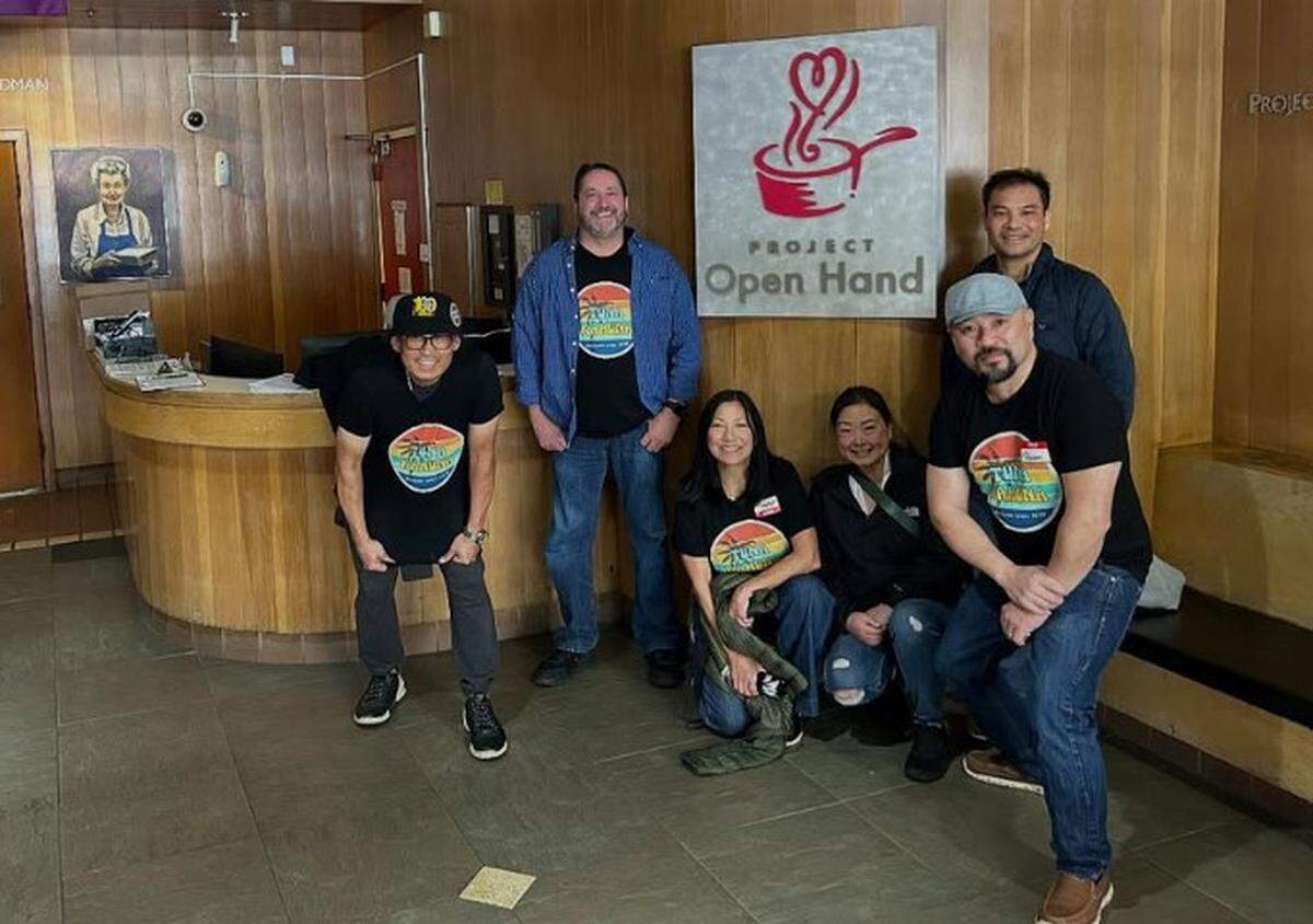 Doug Rush, second from left, volunteering at Project Open Hand in San Francisco.