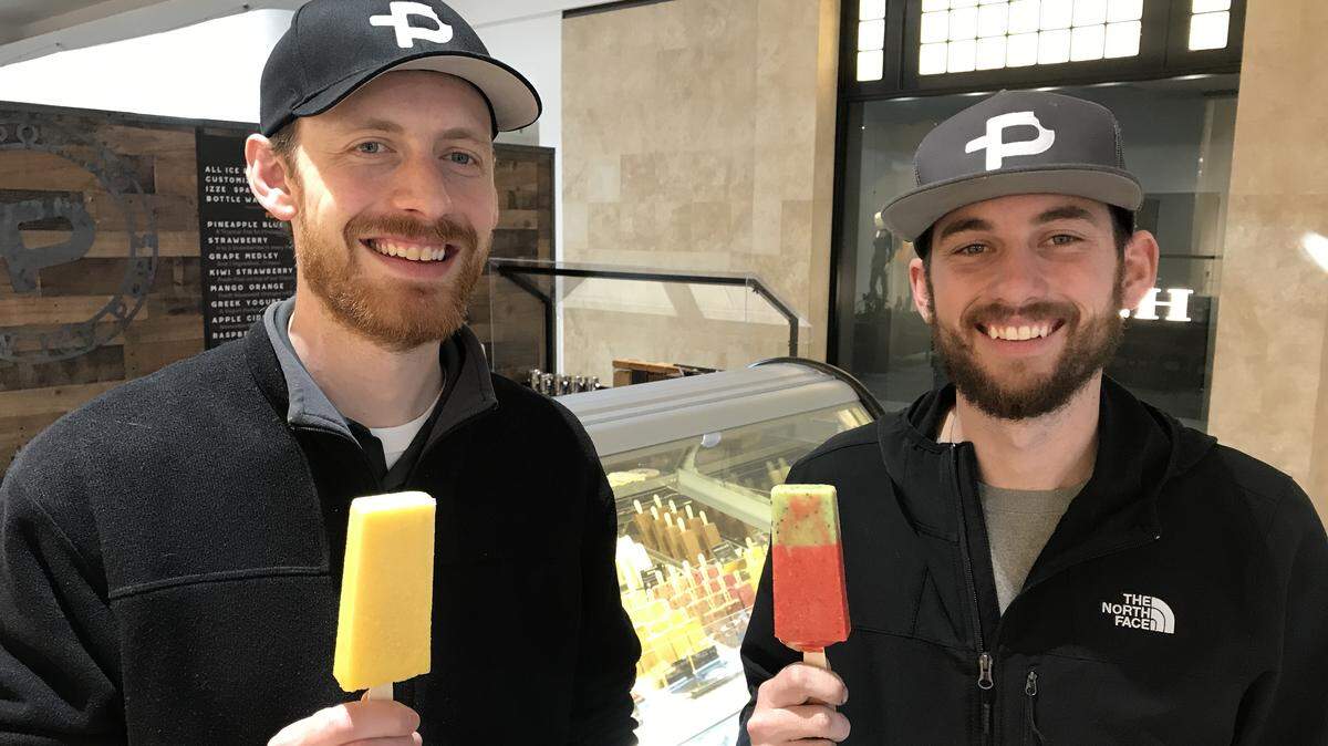 Marshall Stula (left) and Ky Kanaman are owners of the new KC Pop Co. in Oak Park Mall.