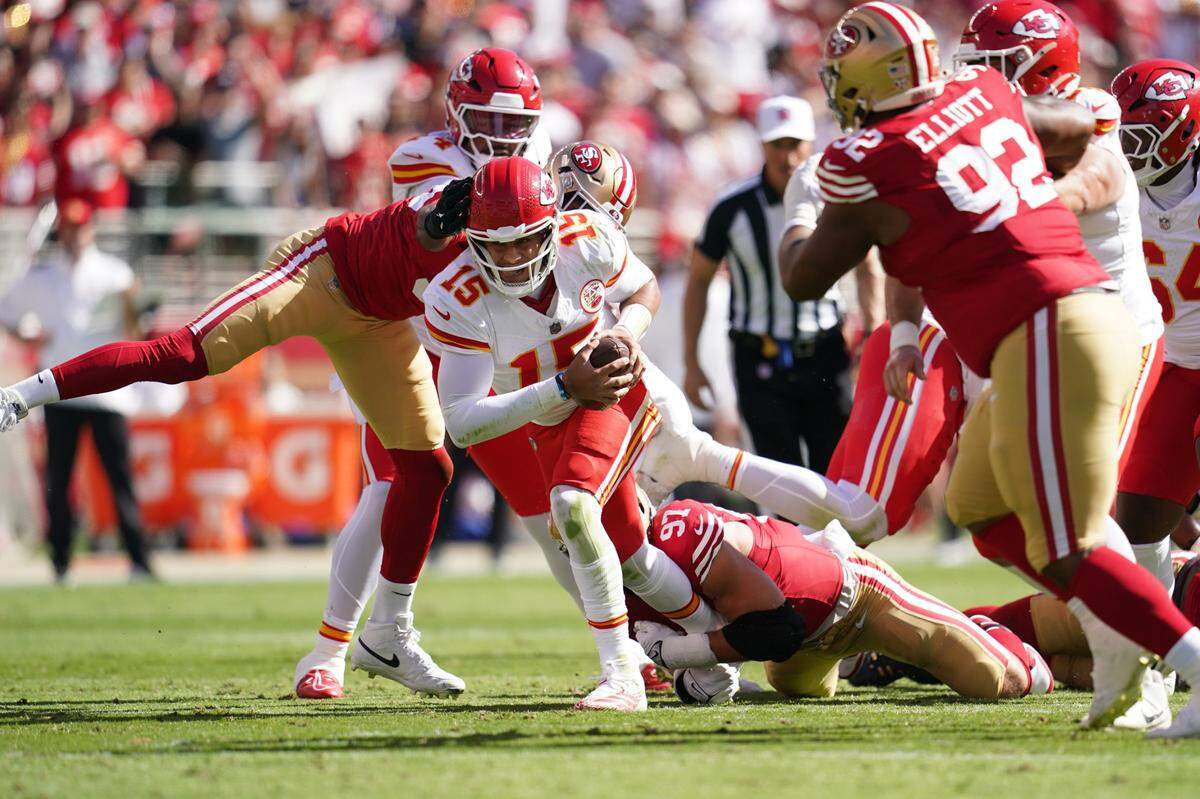 Kansas City Chiefs quarterback Patrick Mahomes (15) is sacked by San Francisco 49ers defensive end Nick Bosa (97) in the first quarter at Levi’s Stadium.