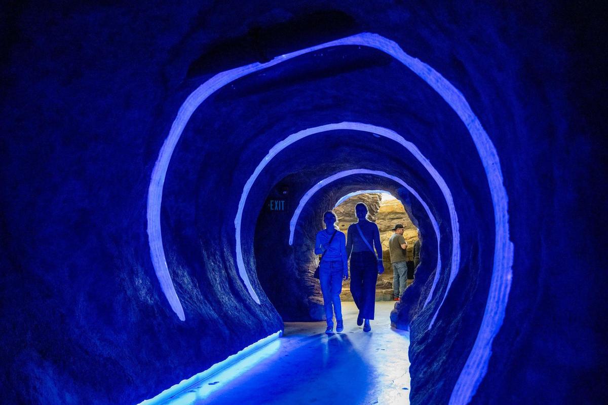 Guests step into the entrance of The Rabbit hOle, the new children’s literature museum in North Kansas City.