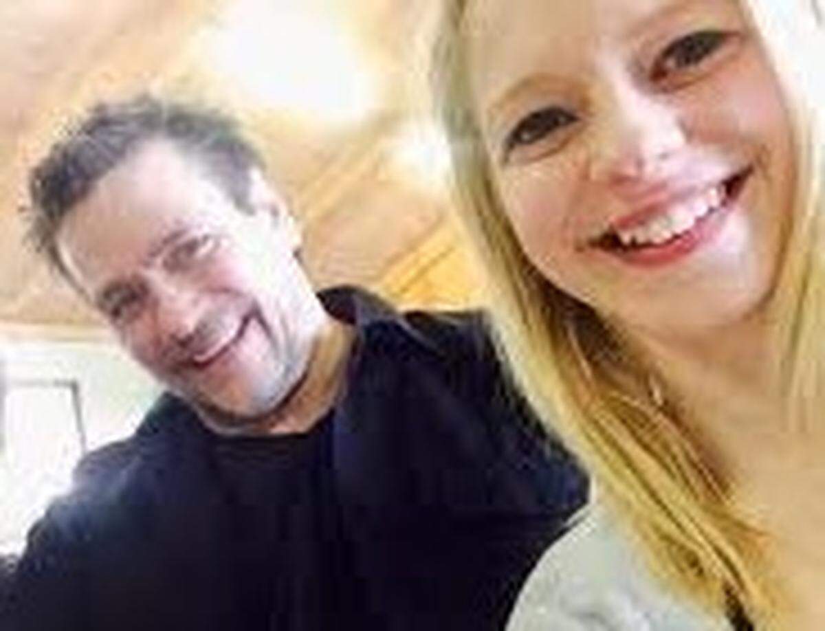 Shannon Hopkins, left, and Mackenzie Hopkins, right, smile for a selfie photograph.