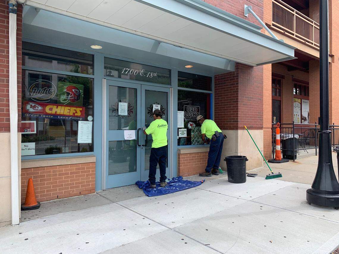 Workers made repairs Thursday after several businesses were vandalized in the historic 18th and Vine Jazz District.