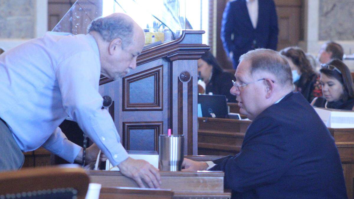 House Minority Leader Tom Saywer (D - Wichita) and House Majority Leader Dan Hawkins (R - Wichita) speak during the medical marijuana floor debate Thursday.
