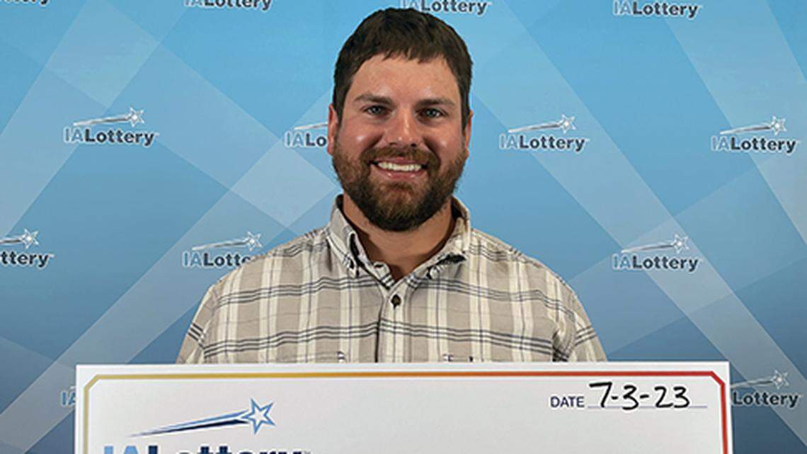 Nick Miller with his oversized check.