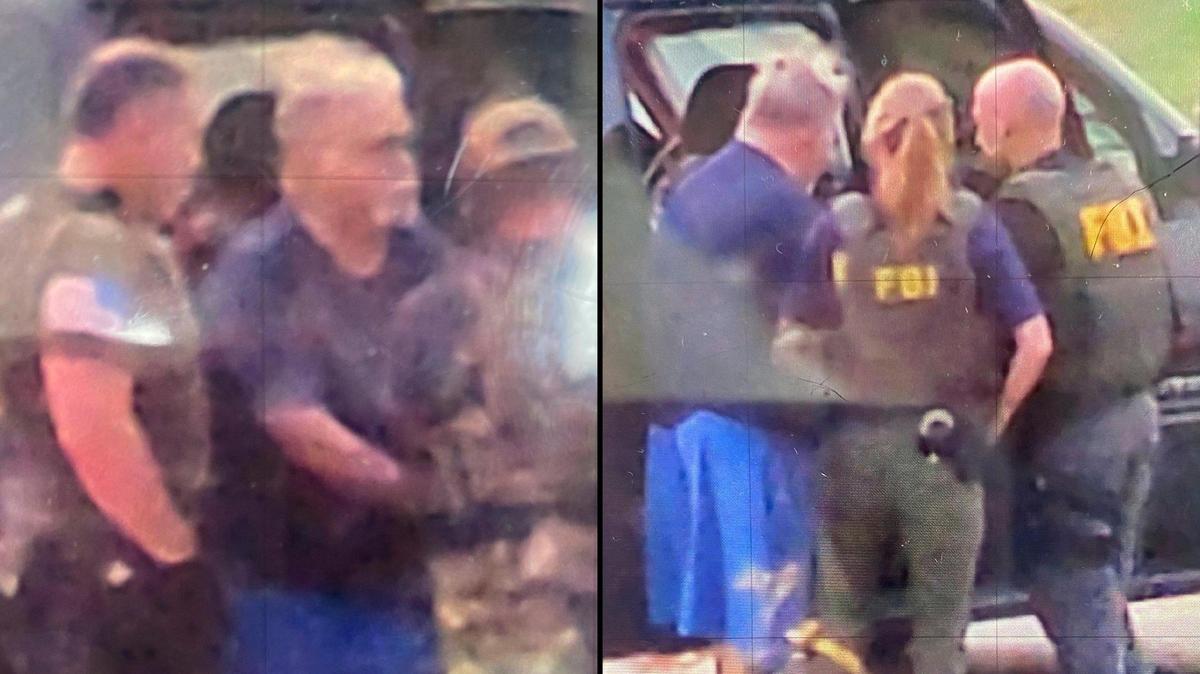 Former Kansas City, Kansas, police detective Roger Golubski is arrested by federal agents at his home Thursday.