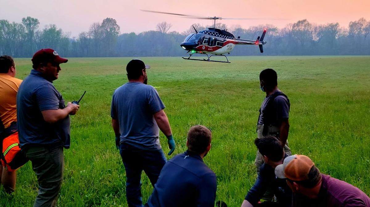 A girl was taken by air to a hospital in Little Rock after she was knocked off a railroad bridge by a passing train, Arkansas police say.