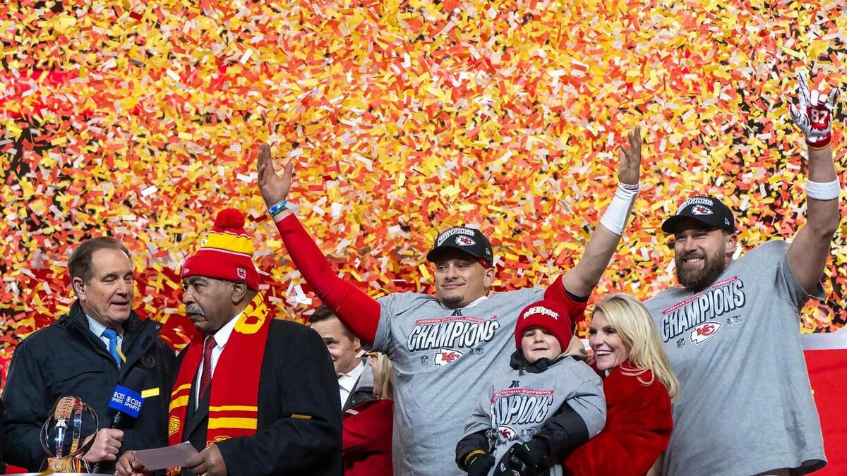 Kansas City quarterback Patrick Mahomes, center, and Chiefs tight end Travis Kelce, right, celebrate their team’s 32-29 win over the Buffalo Bills in the AFC Championship Game on Sunday, Jan. 26, 2025, at GEHA Field at Arrowhead Stadium.