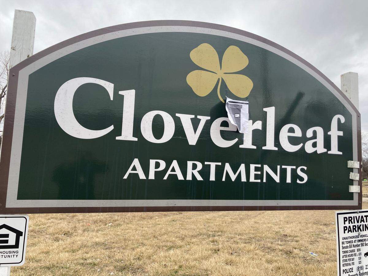 A sign marks the entryway to the Cloverleaf Apartments in south Kansas City.