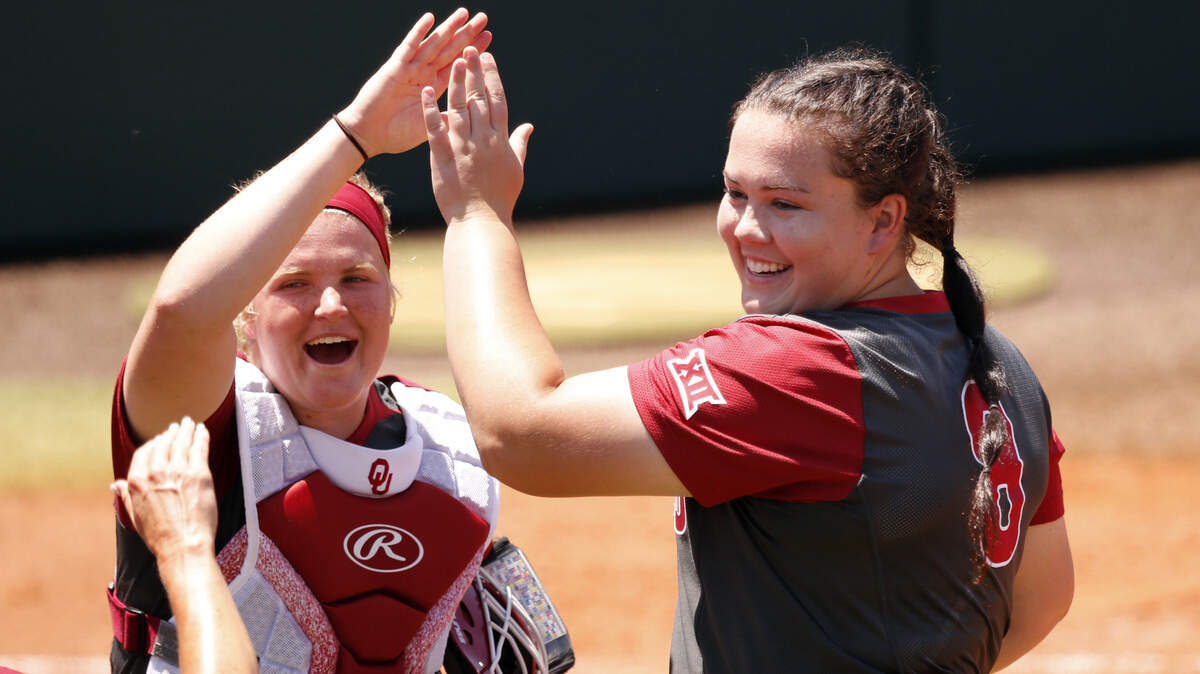 Paige Parker, right, a Truman High grad, just completed one of the best careers in Oklahoma Sooners softball history. Her next stop is a professional career in the game.