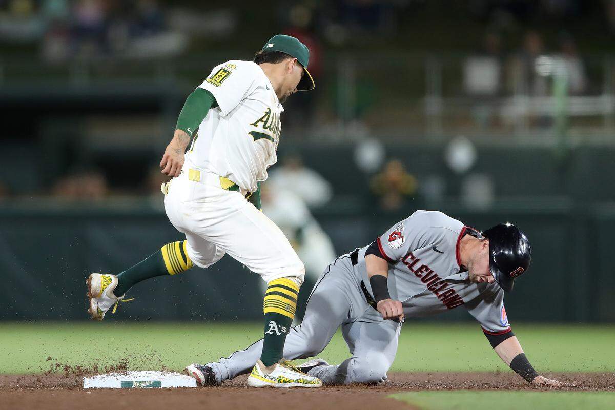 Lane Thomas #8 of the Cleveland Guardians steals second base against the Athletics during the eighth inning at Sutter Health Park on June 21, 2025 in Sacramento, California.