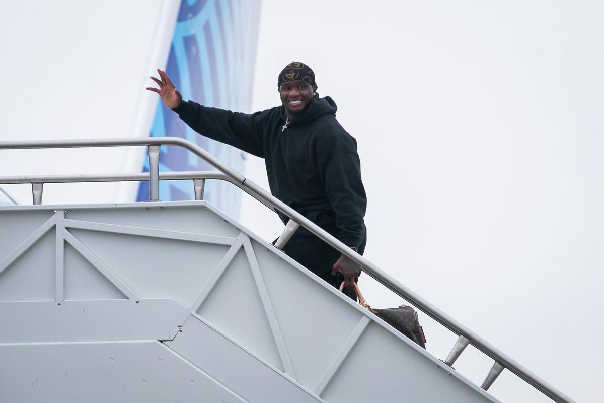 Kansas City Chiefs linebacker Willie Gay waves toward the media while boarding a chartered United flight on their way to Las Vegas for Super Bowl LVIII on Sunday February 4, 2024 at KCI Airport in Kansas City, Missouri.