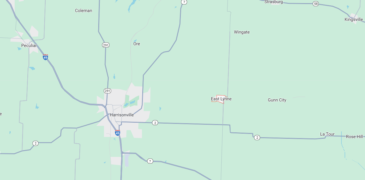 Harrisonville and East Lynne, Missouri are roughly 13 minutes apart. Many residents drive from East Lynne to Harrisonville to complain about the problems with their postal services.