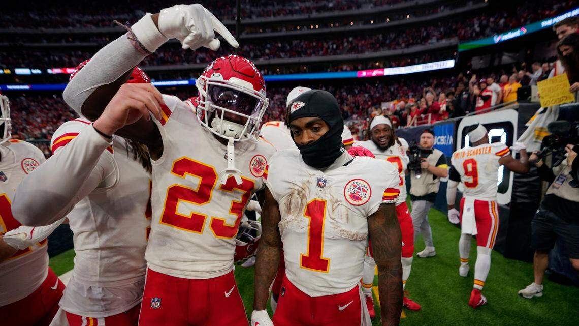 Chiefs running back Jerick McKinnon (No. 1) celebrates with teammates after scoring the winning touchdown in Kansas City’s overtime victory over the host Houston Texans on Sunday at NRG Stadium.