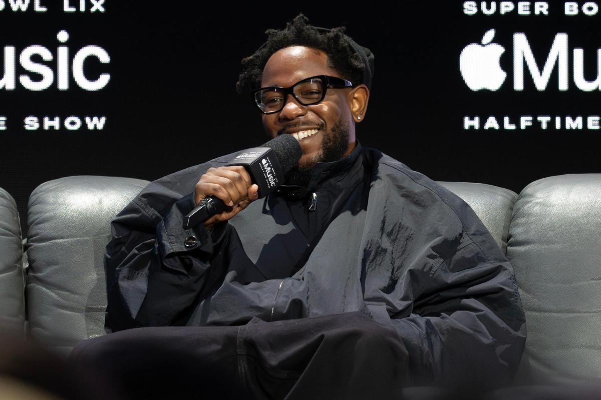 Rapper Kendrick Lamar smiles as he takes questions from a moderated interview during a press conference on Thursday, Feb. 6, 2025, in New Orleans. Lamar will headline the Super Bowl LIX halftime show.