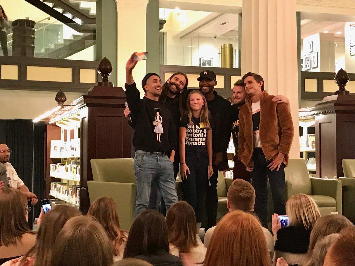 Katherine Ferry, 12, of Prairie Village, got a selfie with the Fab Five at the event, held Nov. 14 at Kansas City Library-Central Branch.