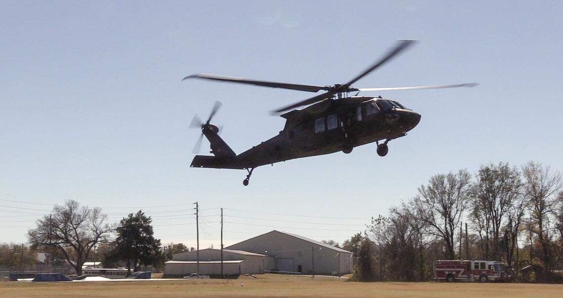 A UH-60 Kansas Army National Guard UH-60 helicopter, also known as a Black Hawk helicopter, lands in Arkansas City, Kansas.