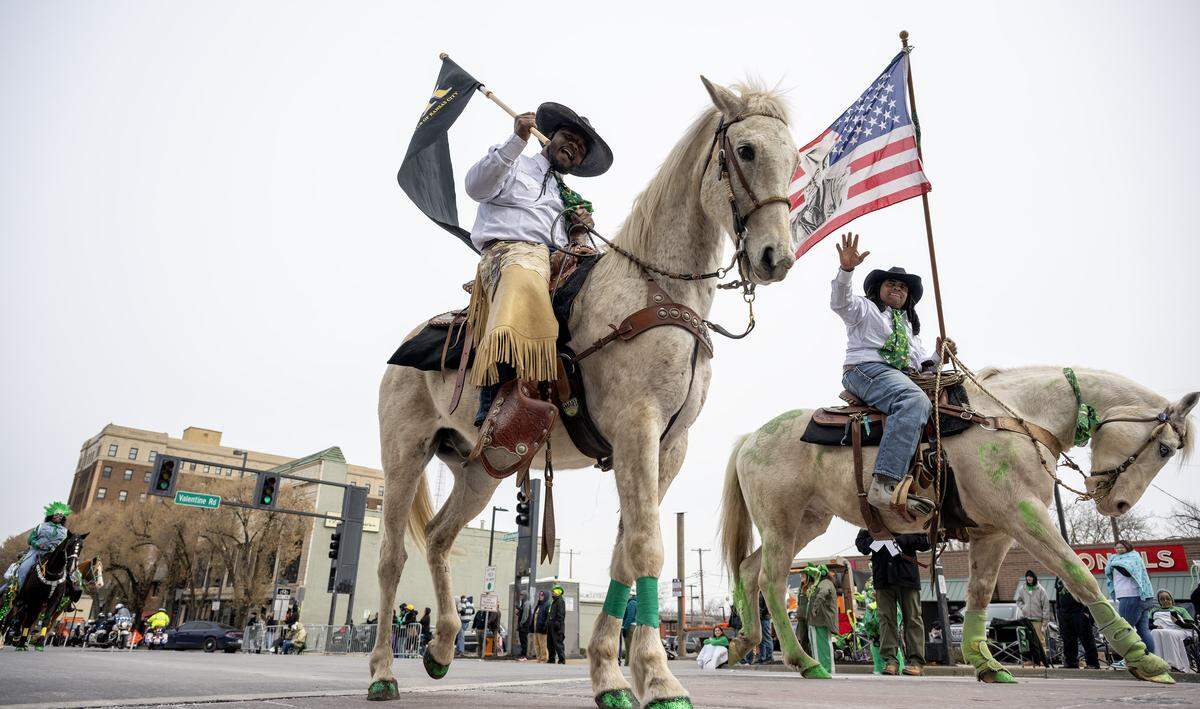 Members of the Rolling G Horse Club Kansas City participate in the St. Patrick's Day parade along Broadway Boulevard on Tuesday, March 17, 2026.