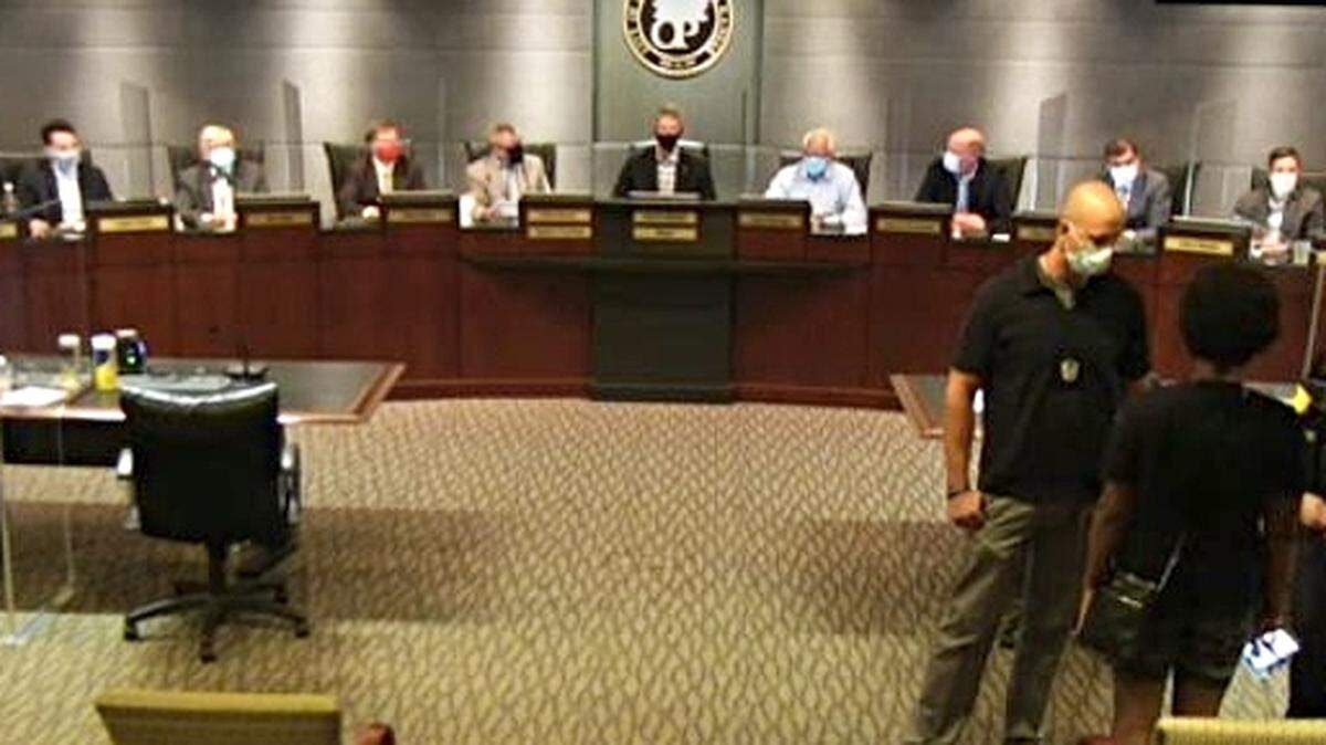 After $70,000 police payout, protesters take over Overland Park council meeting