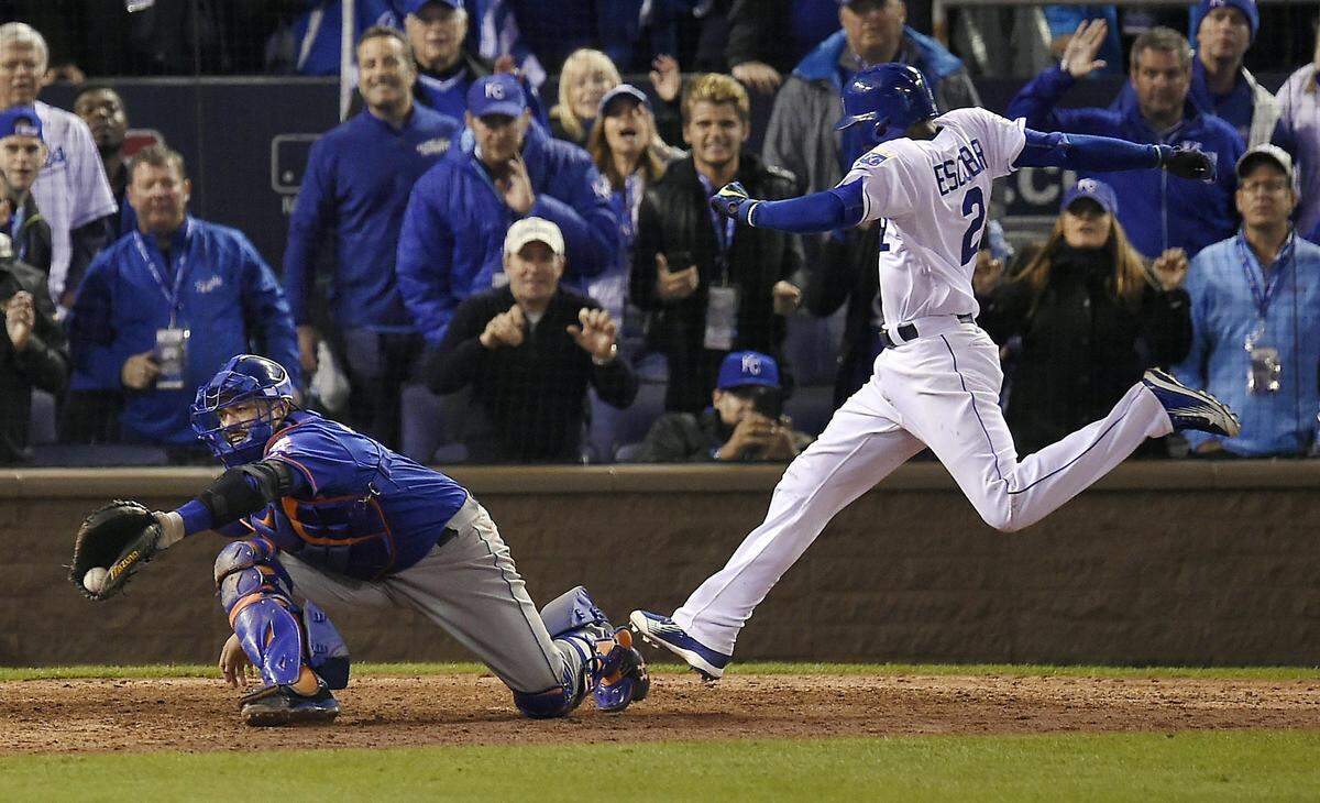 Kansas City Royals shortstop Alcides Escobar scored the winning run in the 14th inning during Game 1 of the World Series on Tuesday, October 27, 2015 at Kauffman Stadium in Kansas City, Mo.