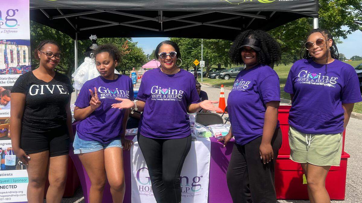 Giving Hope & Help founder Jessica L. McClellan, center, poses with scholarship recipients Riyan Jones, Anteria Pratt Taylor, Sydne Sylvan and Kaicey McKenzie