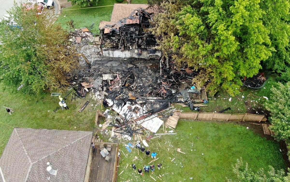Investigators found a person dead in the basement area of a Raytown home that exploded and caught fire Monday night. The explosion left several people injured at the duplex in the 7500 block of Englewood Avenue. The Bureau of Alcohol, Tobacco, Firearms and Explosives were on the scene Tuesday to investigate the explosion.