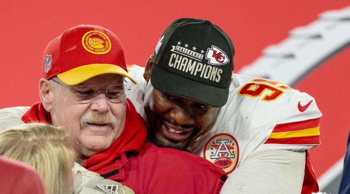 Kansas City Chiefs defensive tackle Chris Jones (95) hugs coach Andy Reid after the Chiefs defeated the Baltimore Ravens 17-10 in the AFC Championship Game on Sunday, Jan. 28, 2024, in Baltimore.